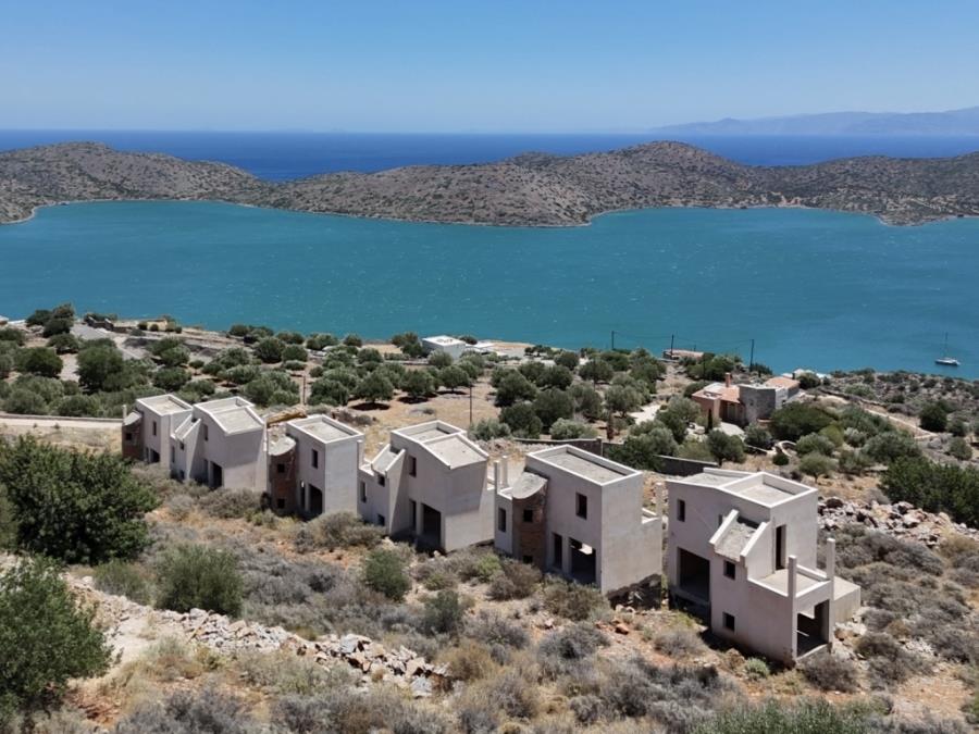 Unfinished complex of villas with swimming pools and sea views for sale