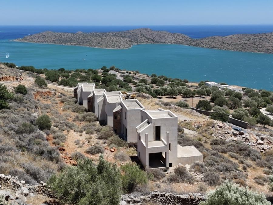 Unfinished complex of villas with swimming pools and sea views for sale