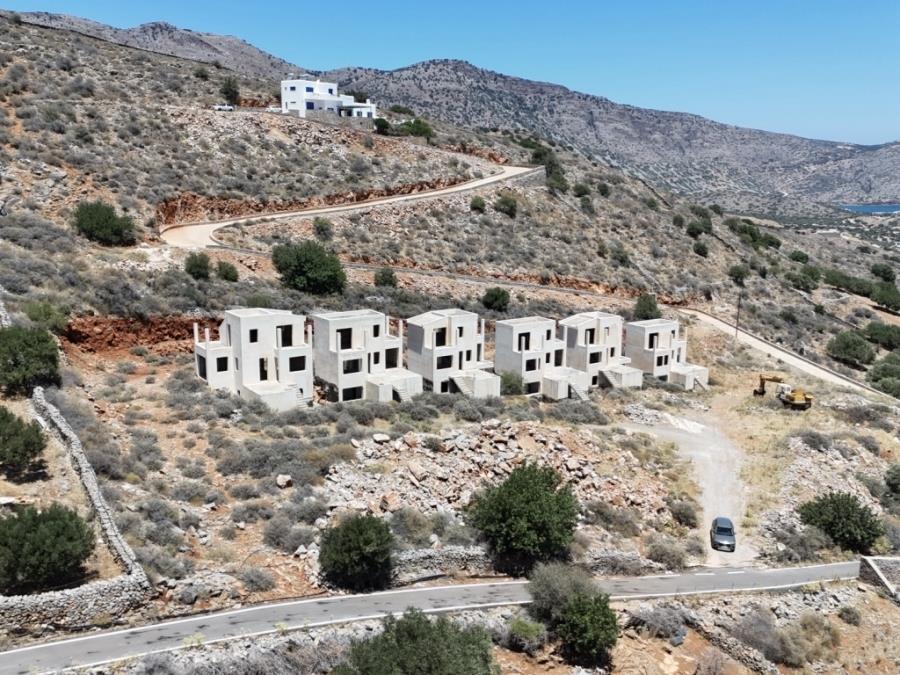 Unfinished complex of villas with swimming pools and sea views for sale