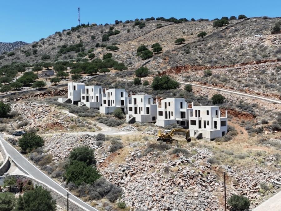 Unfinished complex of villas with swimming pools and sea views for sale