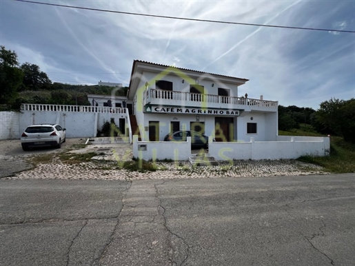 Haus mit 3 Schlafzimmern und Gewerbefläche: Investitionsmöglichkeit in Santa Bárbara de Nexe