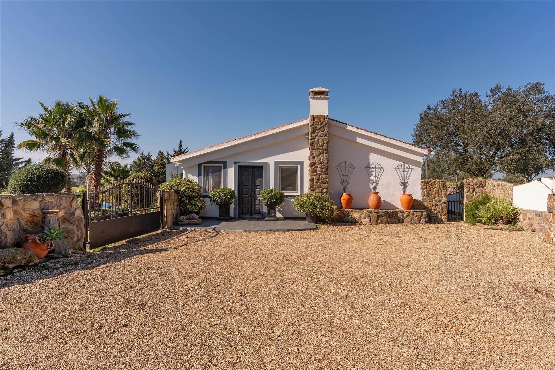 Homestead next to a water reservoir in Ourique