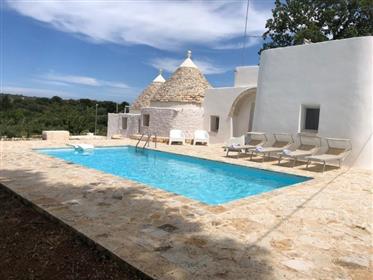 Trulli and lamie with swimming pool