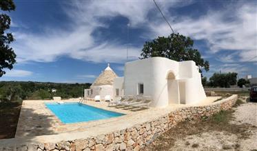 Trulli and lamie with swimming pool