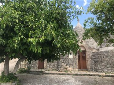 Beautiful complex of trulli for sale in the countryside of Ostuni