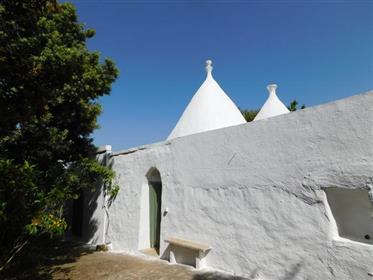 Complex of Trulli and Lamie for sale in its original state
