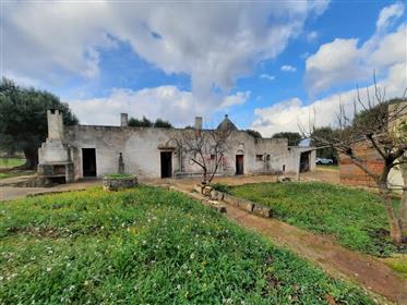 Interesting complex of trulli and lamie for sale