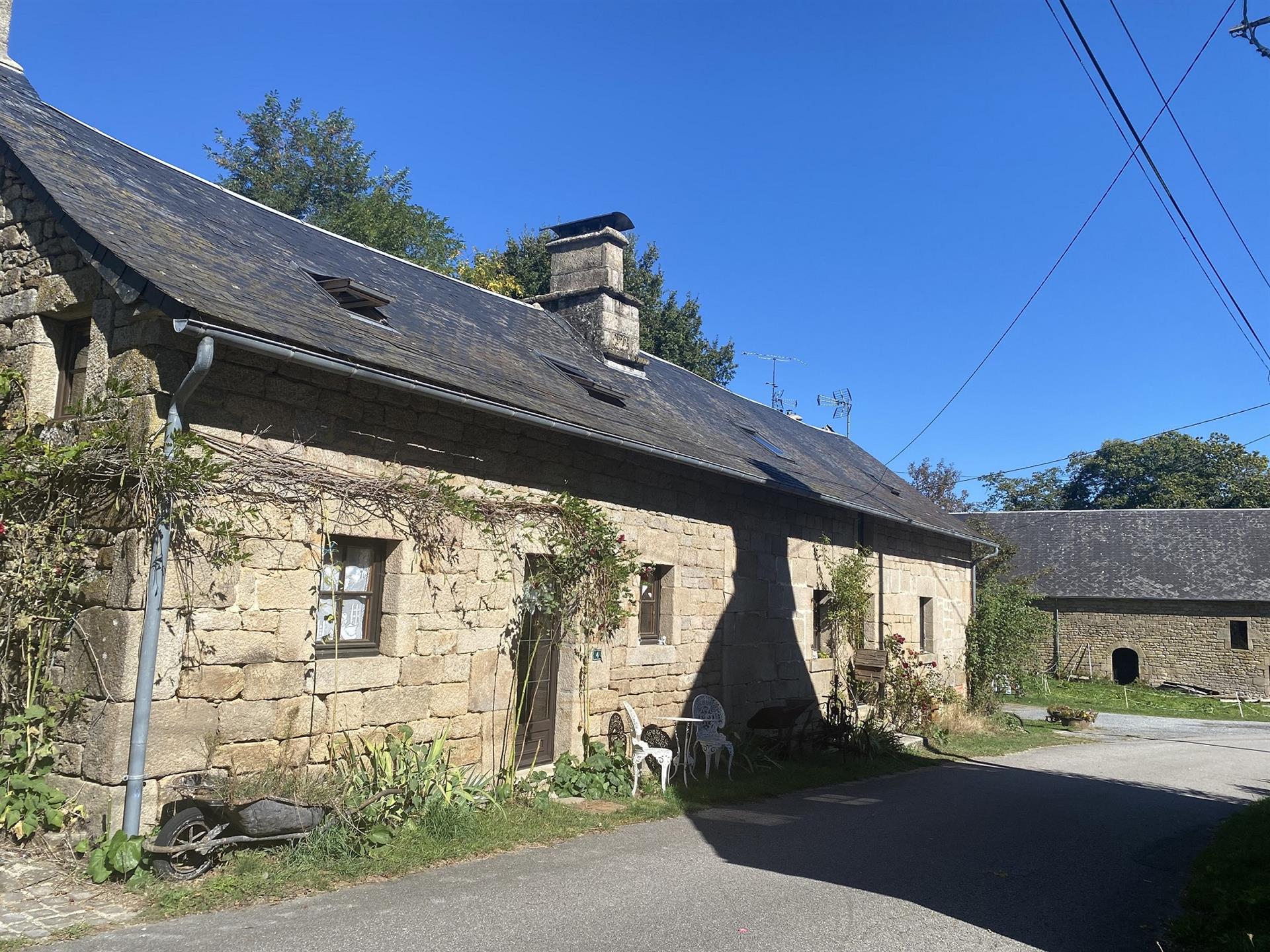 All made in stone property comprising of a main house and outbuildings. B&B option