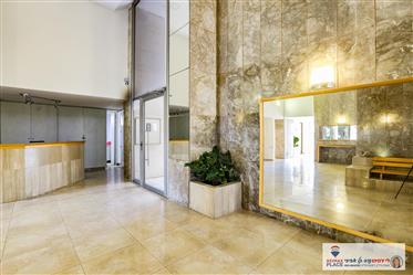 Stunning with a spectacular view of elevator and parking!