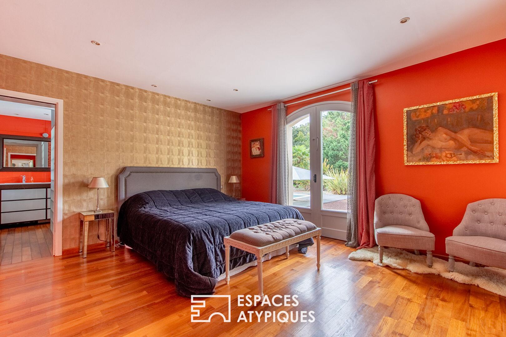 Large property with swimming pool in landscaped grounds