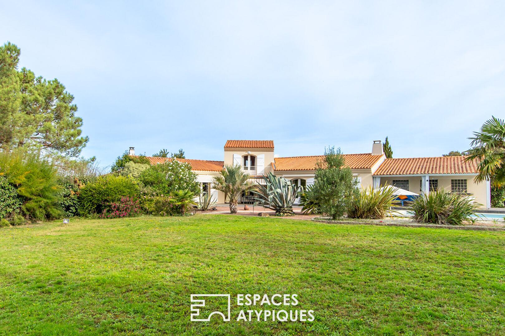 Large property with swimming pool in landscaped grounds