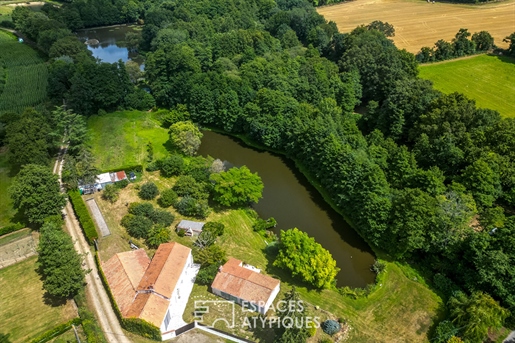 Belle propriété à rénover avec étang au coeur d'un hameau