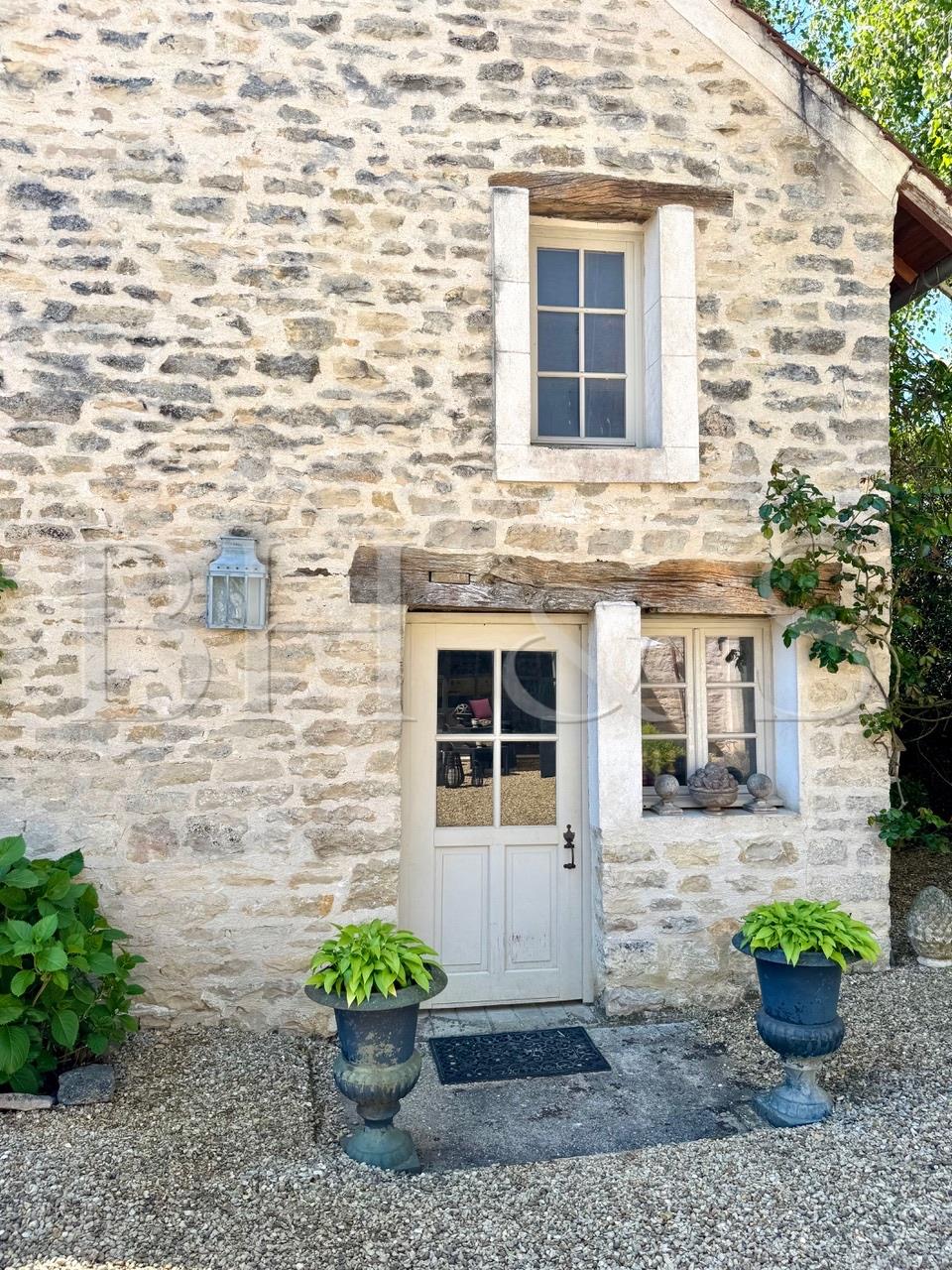 Character property, garden, swimming pool, and outbuildings
