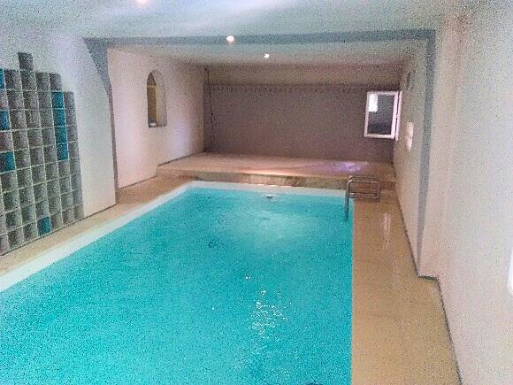 Village house with indoor swimming pool, terrace and garage