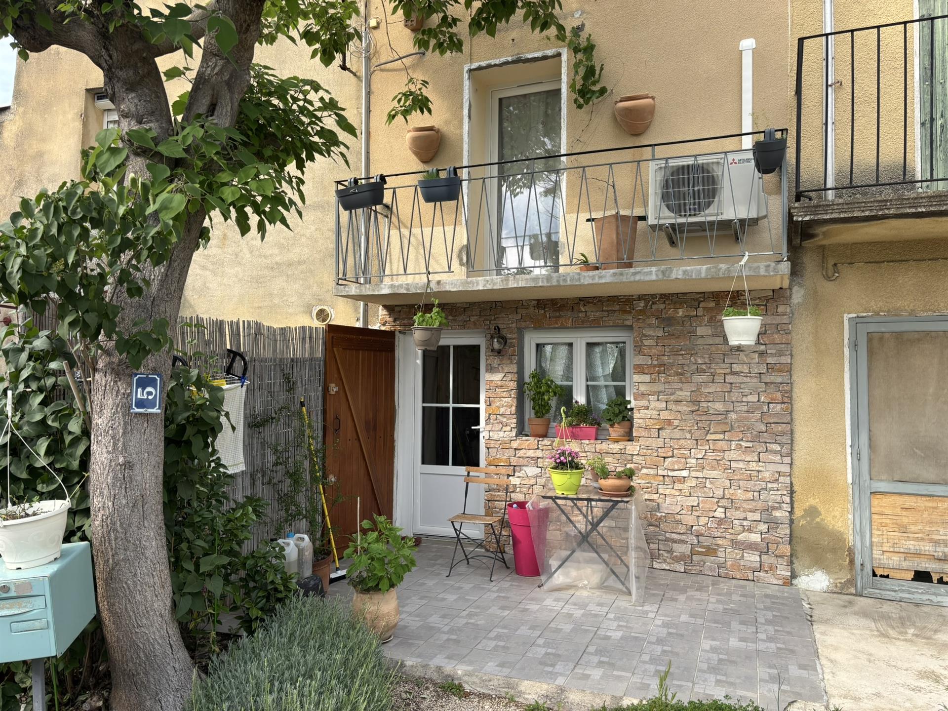 Village house with garage