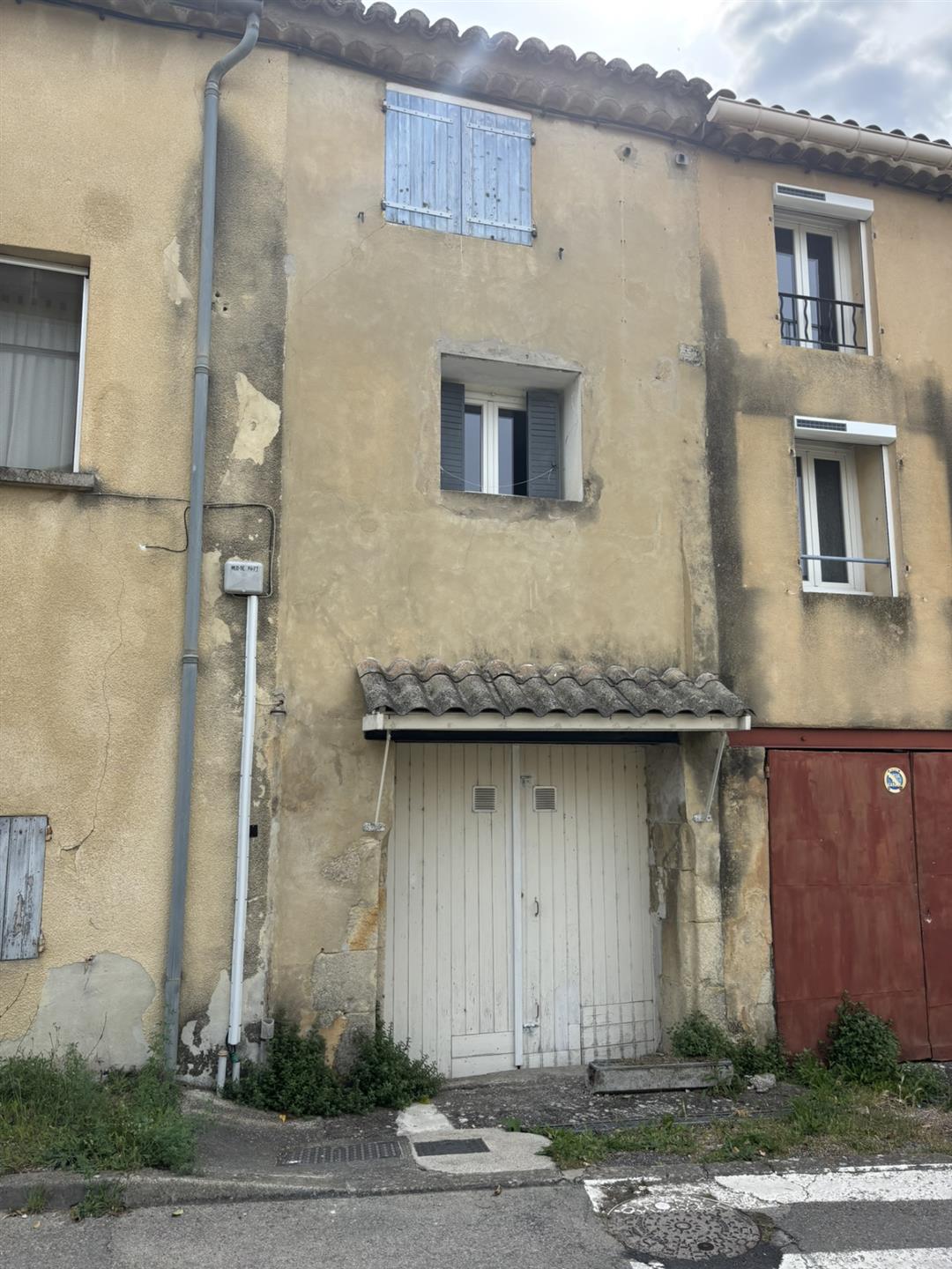 Village house with garage