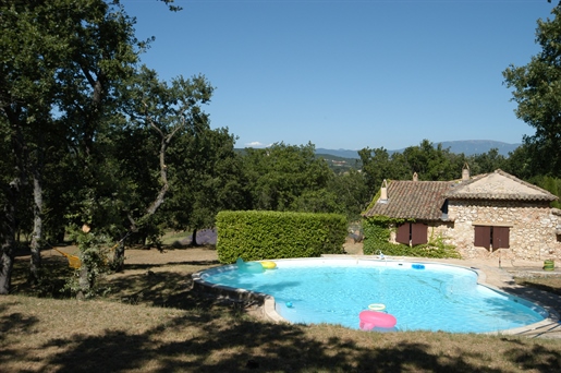Near Grignan, stone Mas on 4 hectares of haven of peace.