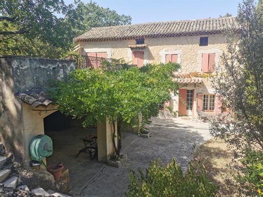 Near Grignan, stone Mas on 4 hectares of haven of peace.