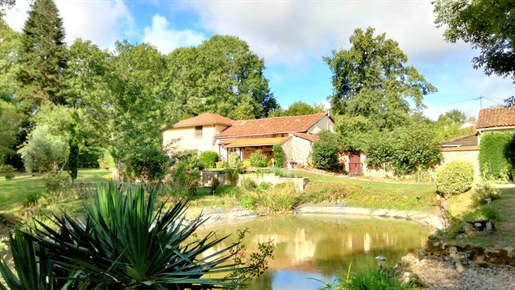Stone house, outbuildings, pond, mature gardens, Charente