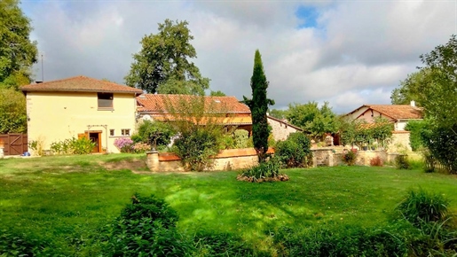 Stone house, outbuildings, pond, mature gardens, Charente