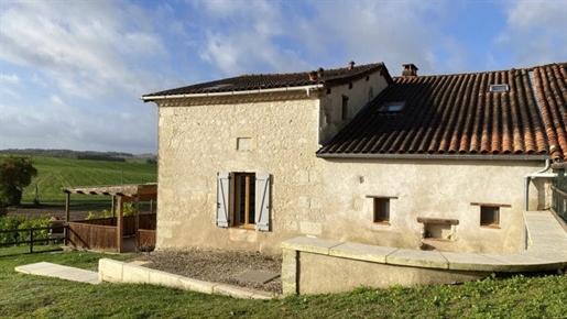 Spacious 5 bedroom house for sale in Charente hamlet with countryside views.
