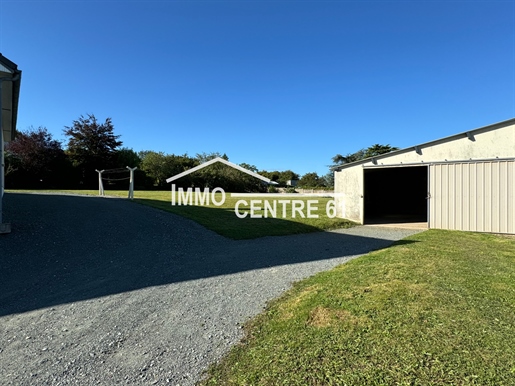 Single storey house on basement with outbuilding