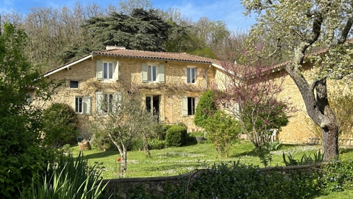 Virtually self-contained country house with swimming pool, outbuildings and "organic" land