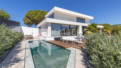 Villa moderne avec piscine, garage/sous-sol, proche plage et