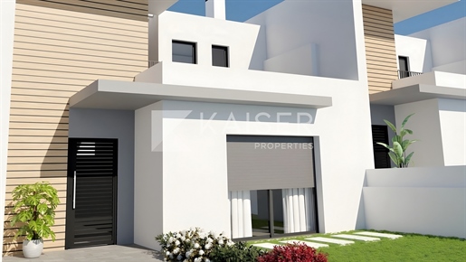 Modern townhouse under construction with basement/garage in