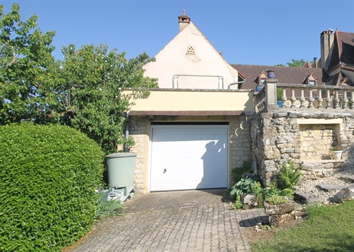 In a beautiful hamlet 5' from shops and services, charming house (stone) semi-detached from a