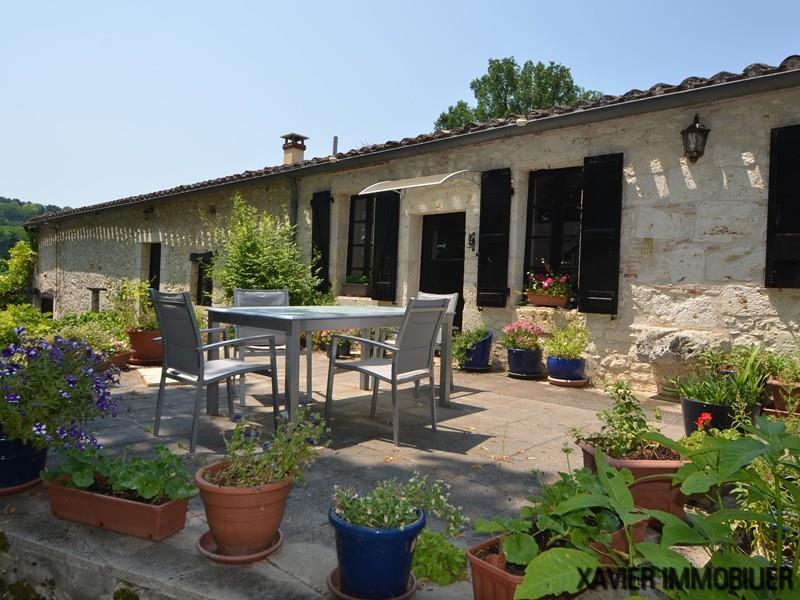  Charming Quercy stone farmhouse set in approx2200sqm of mature gardens.