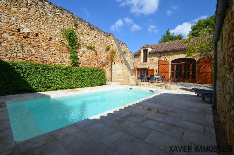 Magnificent stone barn with swimming pool, outbuilding converted into a garage/guest bedroom.