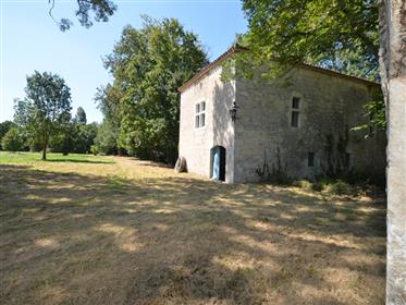 15Th century mill with outbuilding set on approx. 1,9Ha land, located in the countryside at approx.1