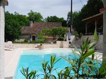 Charming property with studio and 2 independent double bedrooms, swimming pool, located on a plot of