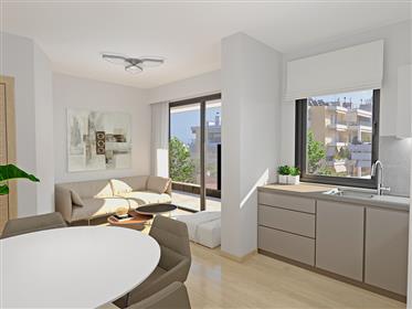 New built Apartments Located between the cultural center of the historic city of Athens in the cosmo