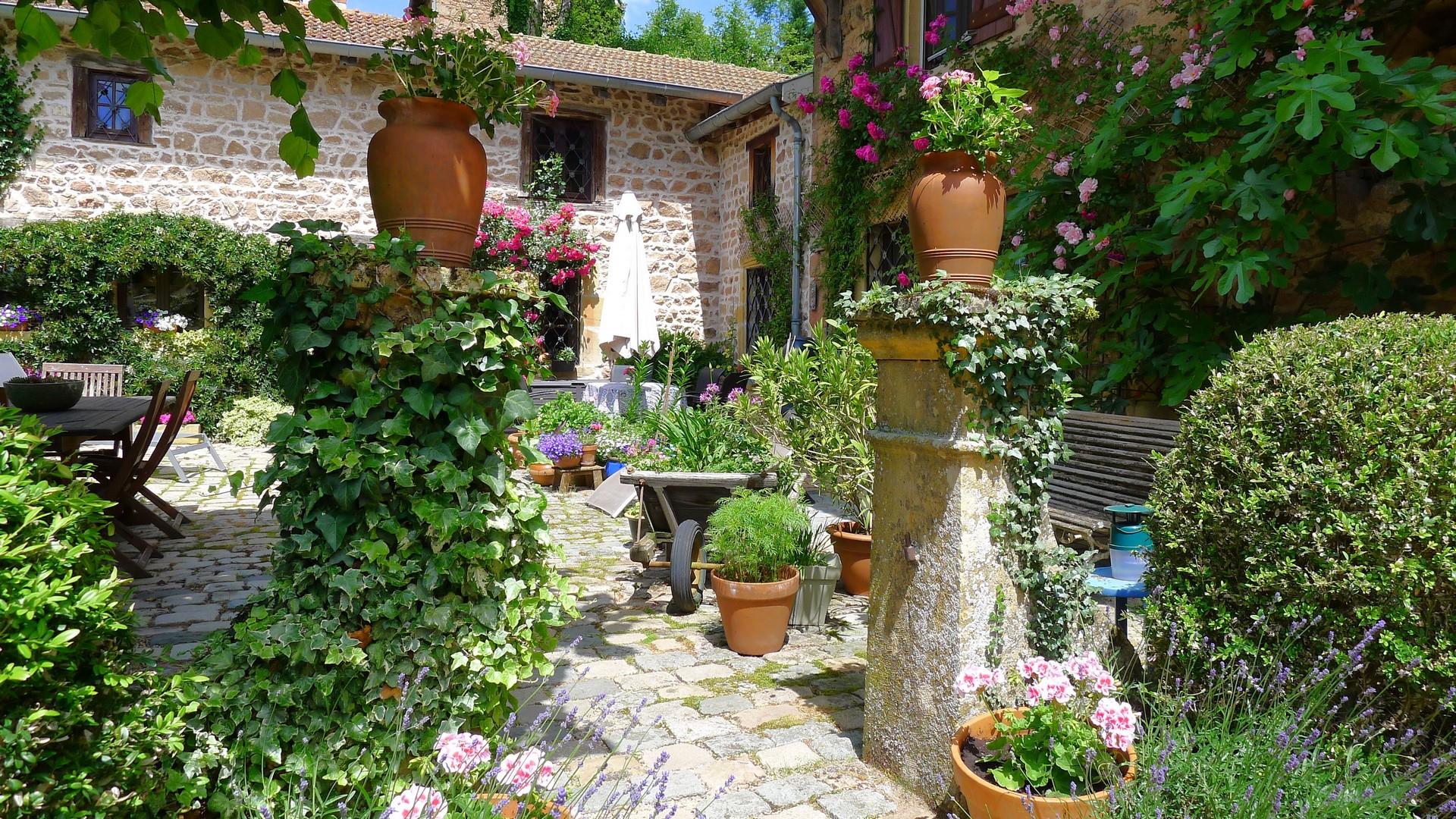 In a charming setting, beautiful stone house of character