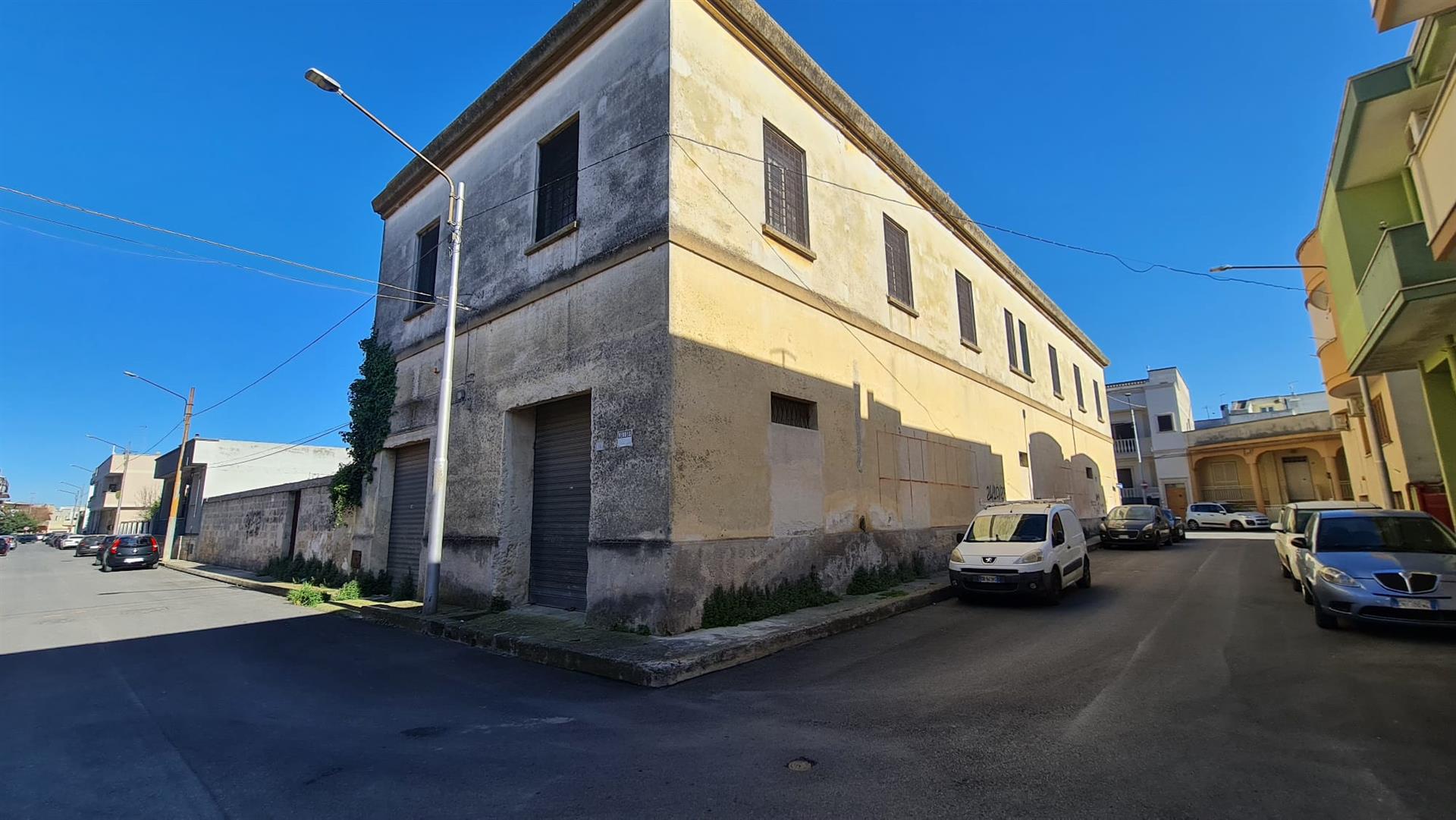 Historic large building with garden