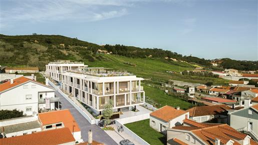 16 apartamentos novos distribuídos por 2 edifícios em São Martinho do Porto.