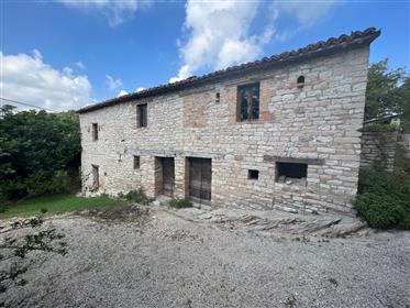 Two farmhouses with land near Montefeltro 