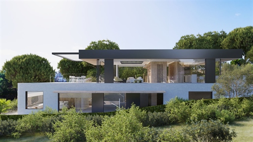 Espectacular villa de nueva construcción en primera línea de mar en Cala Mandia