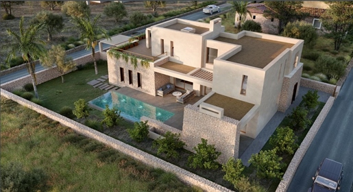 Villa mediterránea de obra nueva con vistas parciales al mar y piscina en Pòrtol/ Marratxi
