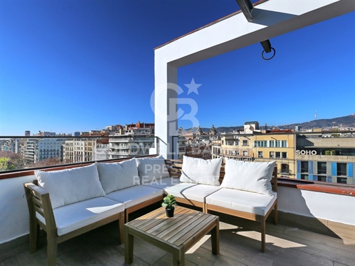 Penthouse with terrace overlooking the Eixample district of Barcelona.