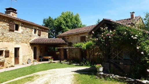 Exceptional secluded location for this traditional stone house with outbuildings with 20 acres of la