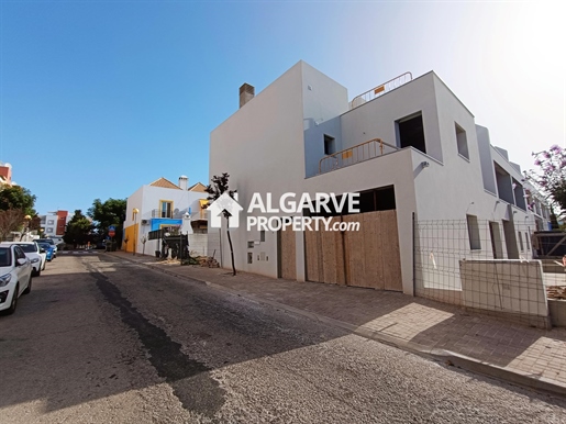 Four bedroom semi-detached house close to cafes and restaurants with a view over the Ria Formosa in
