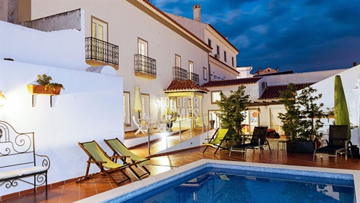 Bem sucedida casa de hóspedes com 11 quartos e piscina na histórica Arraiolos, Alentejo
