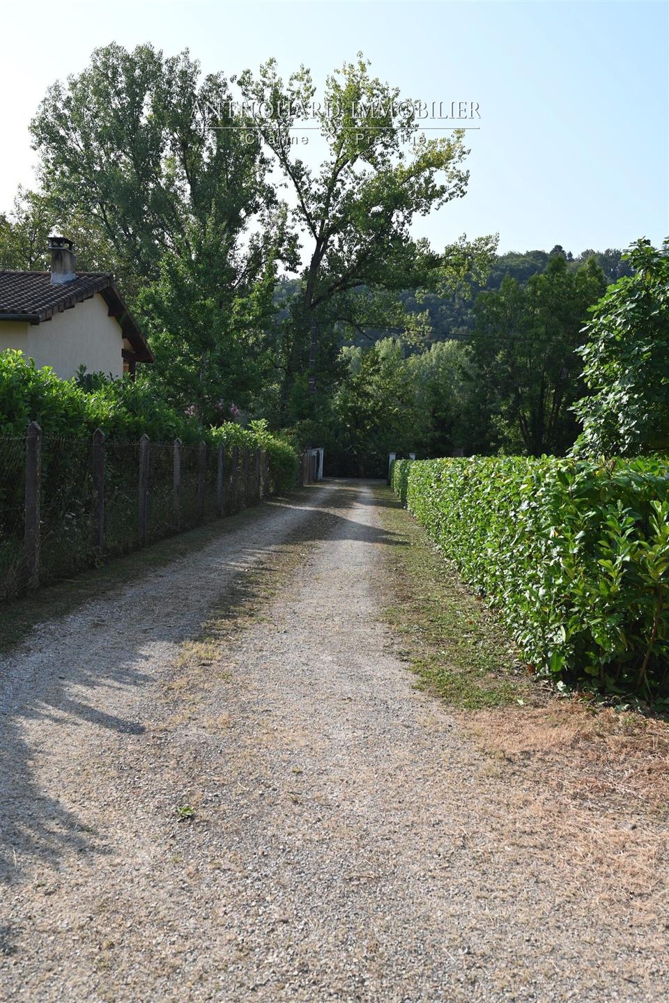 House with garden, riverside