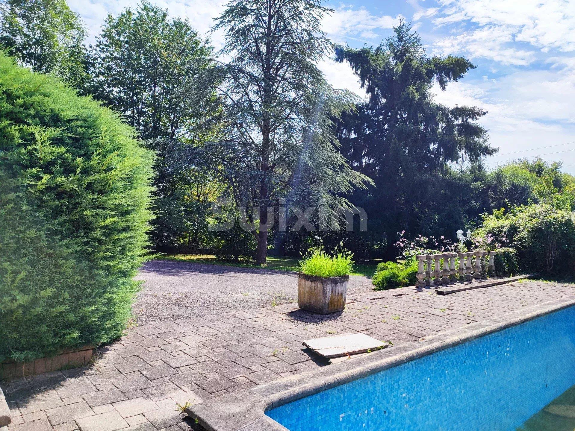 Large family home with swimming pool.