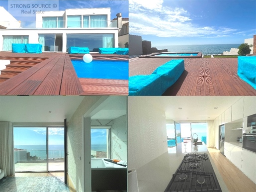 Fantastique villa de 5 chambres avec une vue imprenable sur la mer, en face de la plage.