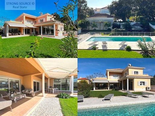 Hermosa y confortable villa de 4 dormitorios con gran jardín y piscina climatizada en Azeitão, en un