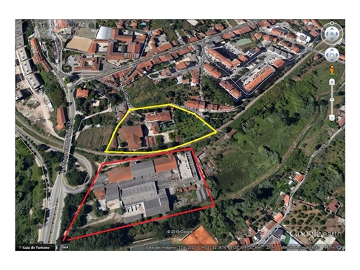 Urban land for sale with old factory buildings, close to Avenida marginal and the Mondego river, in